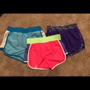 Three pairs of assorted girls workout shorts
